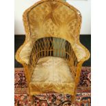 A Victorian upholstered cane basket chair, H. 105cm.