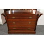 An unusual early 20th C mahogany three drawer chest with wide top and brass handles, W. 152cm x 56cm