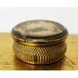 A fine 19th C. engine turned gilt metal and hardstone hinged snuff box, dia. 5cm.