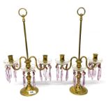 A pair of 19th Century gilt brass and glass portable candelabra with amethyst coloured drops, H.