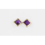 A pair of 9ct yellow gold amethyst set stud earrings, L. 0.6cm.