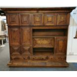 A mid 20th C. continental carved oak cabinet, 212cm x 192cm.