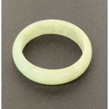 A fine Chinese pale green jade wedding ring, W. 5.5mm ring size - U.
