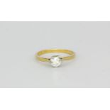 An 18ct yellow gold and platinum brilliant cut diamond set solitaire ring, approx. 0.57ct, (O.5).