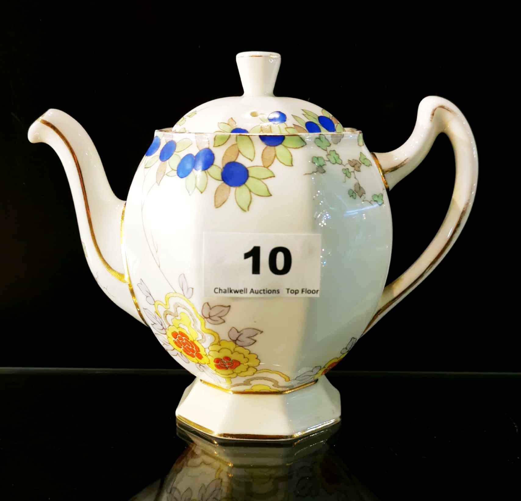 An early 20th C. Royal Doulton tea for one set. - Image 3 of 5