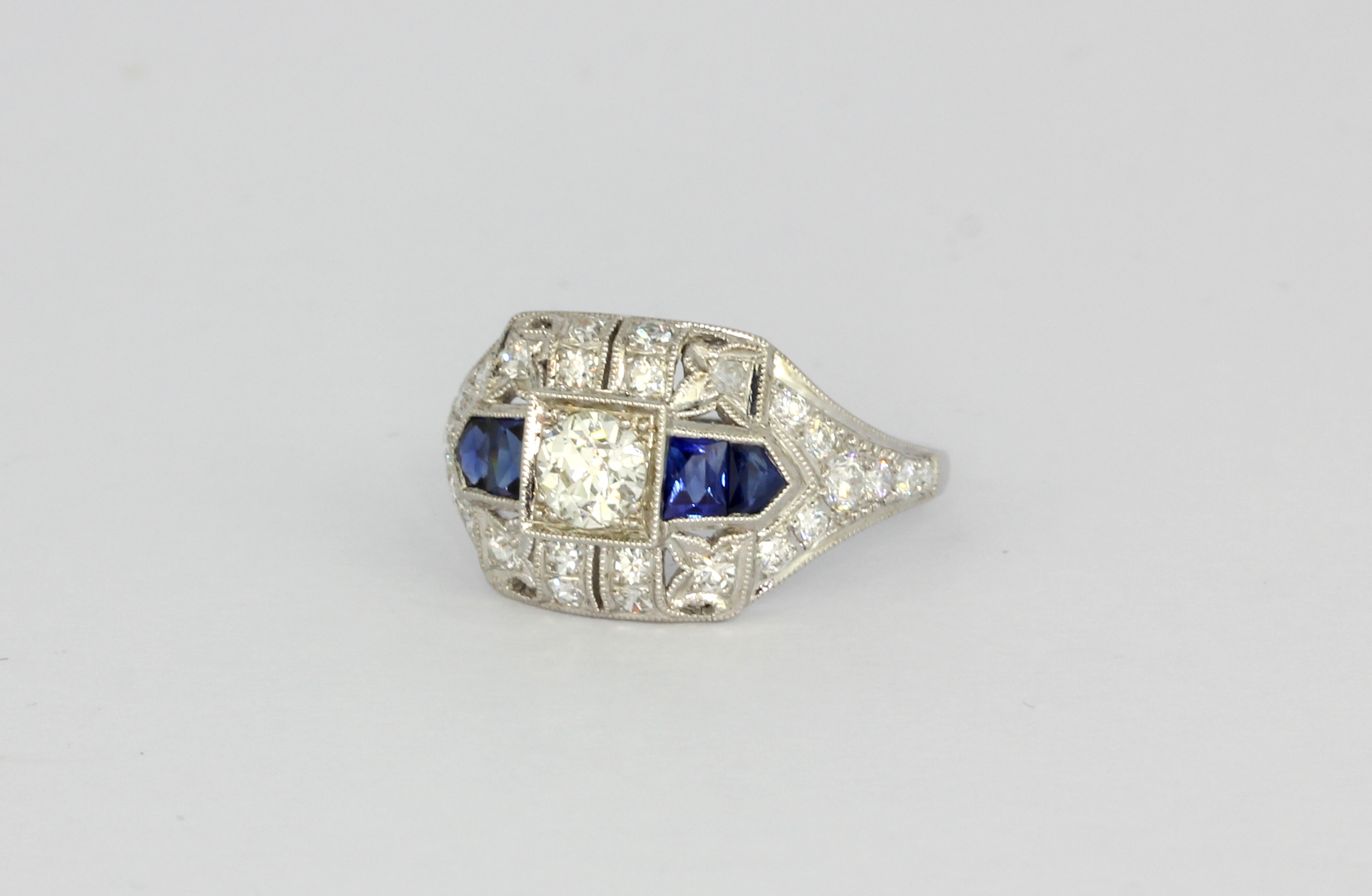 An Art Deco style platinum sapphire and diamond set ring, (M.5). - Image 2 of 3