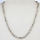 An 18ct white gold graduated necklace set with brilliant cut diamonds, approx. 18.75ct overall,