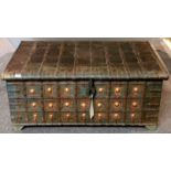 An iron bound Indian heavy hardwood trunk/coffee table, 67cm x 114cm x 50cm.