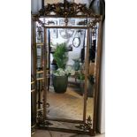 A contemporary reproduction French style gilt mirror, W. 92cm x H. 182cm.