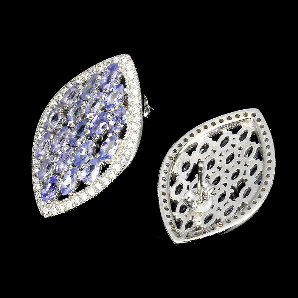 A pair of 925 silver earrings set with tanzanites and white stones, L. 2.5cm. - Image 2 of 2