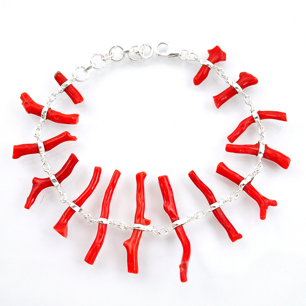 A 925 silver coral set bracelet, L. 20cm.