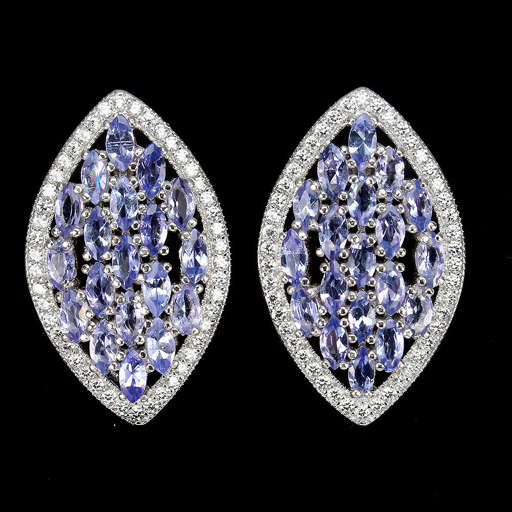 A pair of 925 silver earrings set with tanzanites and white stones, L. 2.5cm.