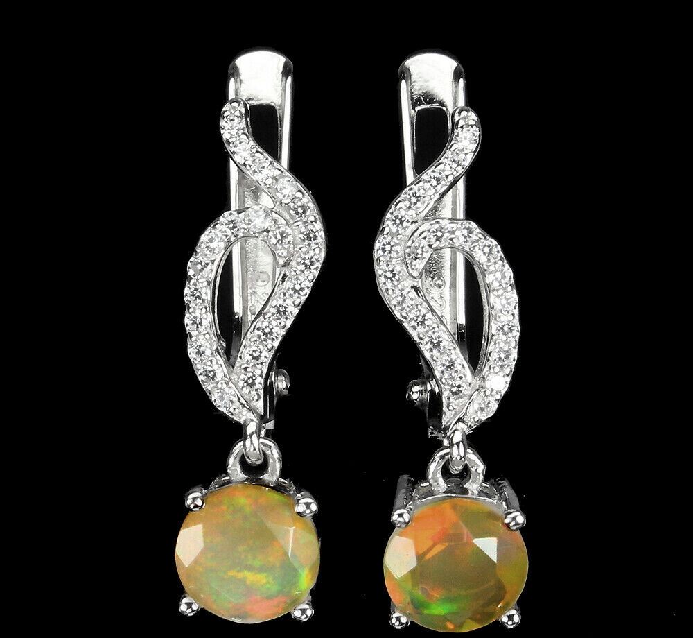 A pair of 925 silver drop earrings set with opals and white stones, L. 2.5cm.