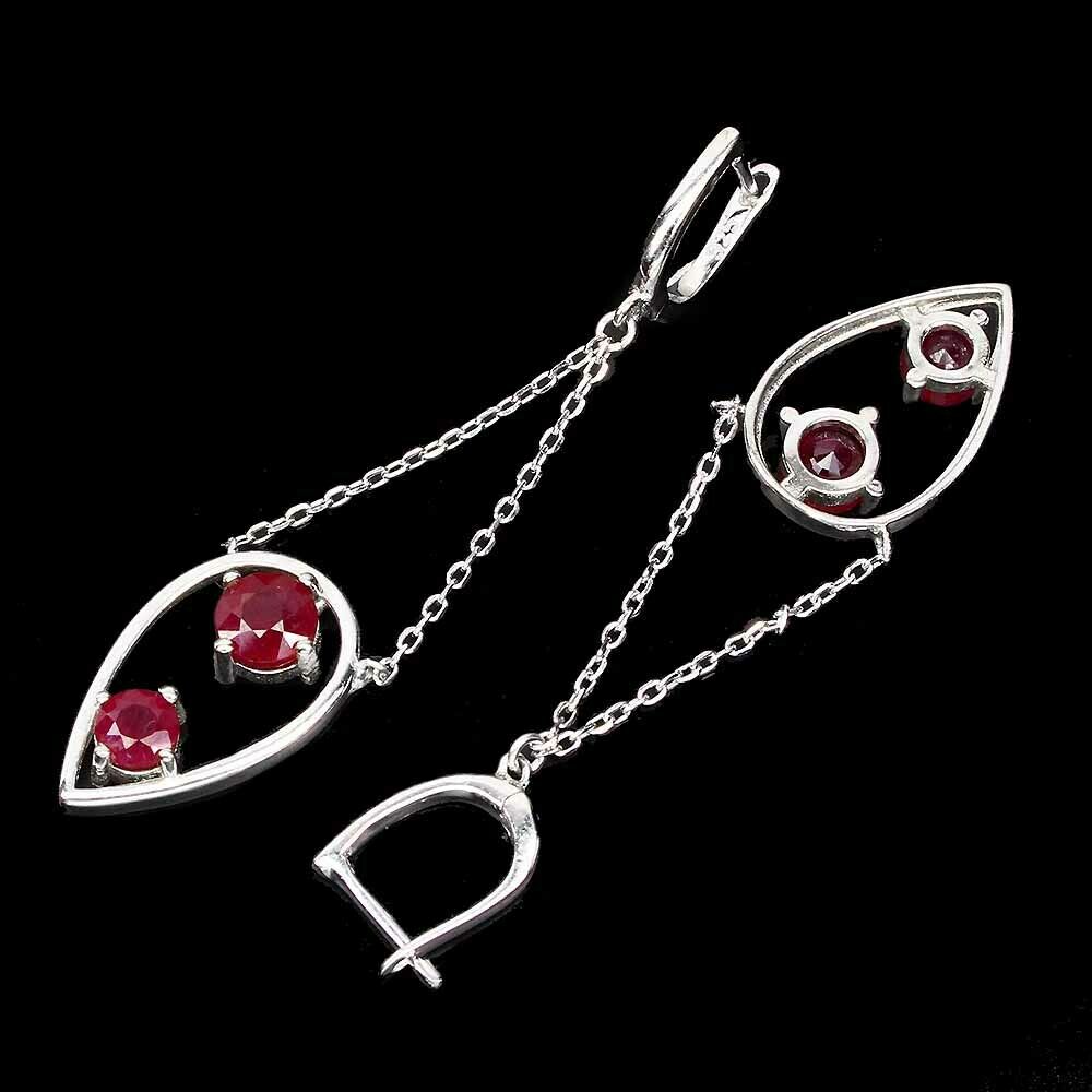 A pair of 925 silver drop earrings set with round cut rubies, L. 6cm. - Image 2 of 2