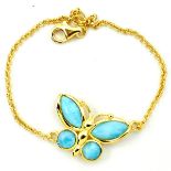 A 925 silver gilt butterfly shaped larimar set bracelet, L. 18cm.