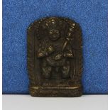 A small Tibetan bronze devotional deity figure, H. 5cm.