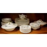 An extensive Royal Doulton 'Coppice' pattern dinner service. Minimum of six settings.