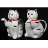 A pair of mid-20th C. Chinese cat shaped porcelain teapots, H. 17cm.