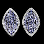 A pair of 925 silver earrings set with tanzanites and white stones, L. 2.5cm.