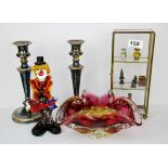 A pair of silver plated candlesticks together with a Murano glass clown, glass bowl and a cabinet of
