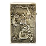 A superb Chinese hallmarked silver card case decorated with dragons and chrysanthemums, 11 x 7cm.
