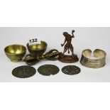 A group of Tibetan bronze and white metal items, figure H. 8cm.