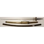 A Japanese wooden sheath practice sword, L. 94cm. together with a further sword and a fencing