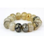 A polished banded agate bead bracelet, L. 1.5 cm.