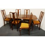 An oak refectory dining table and six mahogany dining chairs.