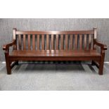 A large wooden garden bench, W. 182cm.