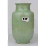 A mid-20th C. Chinese incised celadon glazed porcelain vase, H. 23cm. Condition: Minor chip to rim.