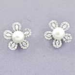 A pair of 925 silver pearl and white stone set flower shaped earrings, Dia. 1.6cm.