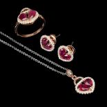 A matching suite of ring, pair of earrings and pendant and chain set with pear cut rubies and