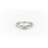 A platinum solitaire ring set with an old cut diamond, approx. 0.31ct, (J).