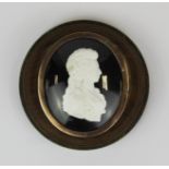 An interesting rose metal mounted (possibly gold) cameo portrait of Queen Charlotte, with a hand