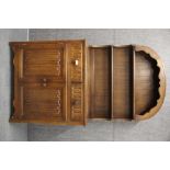 An oak linen fold dresser, W. 95 x 44cm. H. 179cm.