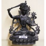 A Tibetan bronze figure of a seated Tara, H. 21cm.