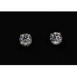 A pair of 18ct white gold (stamped 750) stud earrings set with brilliant cut diamonds, approx. 1.