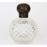 A hallmarked silver topped perfume bottle, L.12cm.
