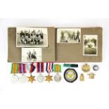 A collection of medals and an associated photograph album.