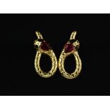 A pair of 925 silver gilt snake shaped earrings set with pear cut ruby's and sapphire set eyes, L.