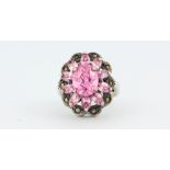 A 925 silver marcasite and pink stone set ring, (O).