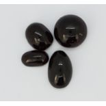 A quantity of unmounted cabochon cut garnets, approx. 63.74ct.