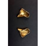 A pair of 9ct yellow gold stud earrings, L. 1.6cm.