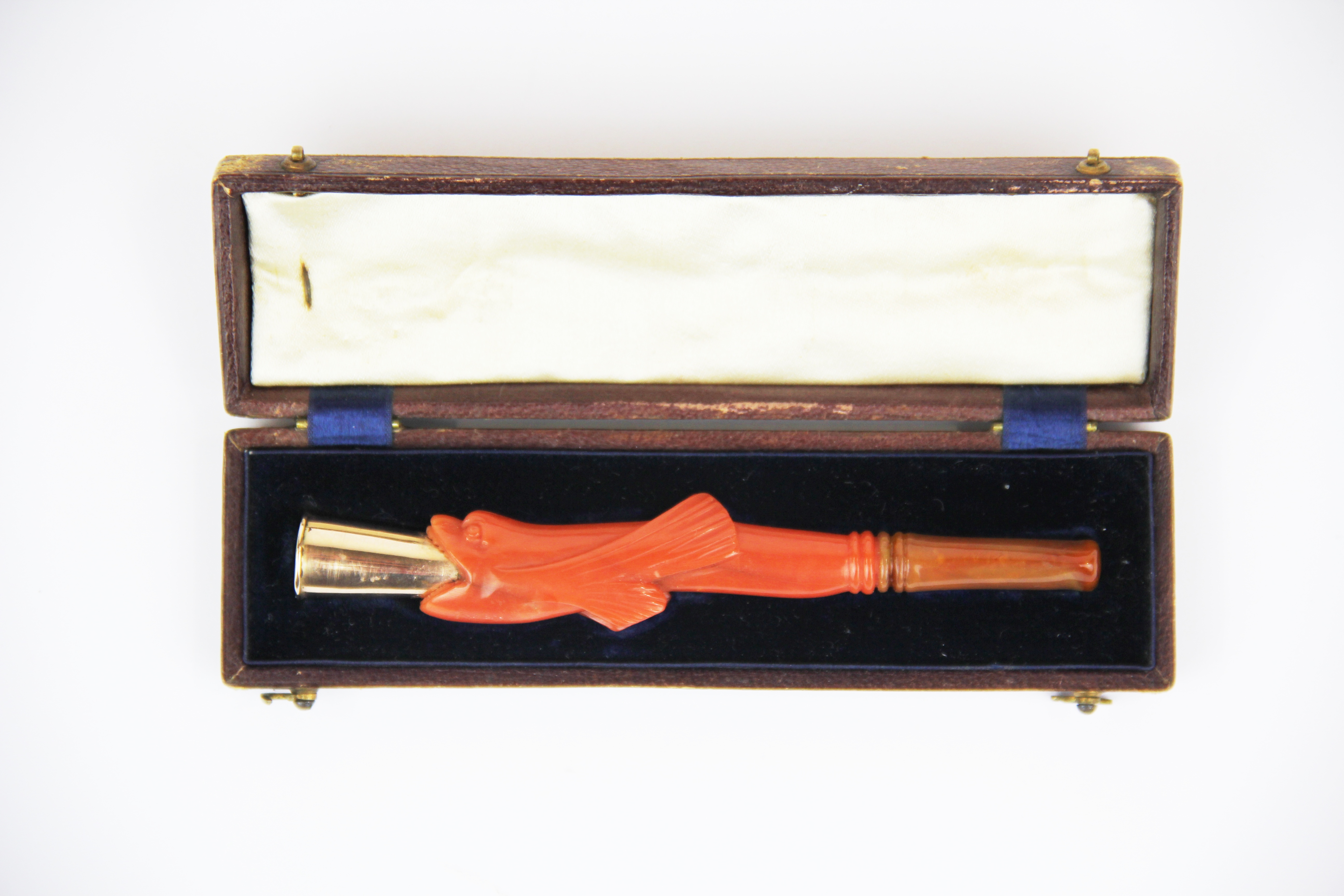 A rare Chinese 19th / early 20th century carved coral and rose metal (tested gold) cheroot holder,