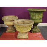 Three vintage concrete garden planters, tallest 52cm.