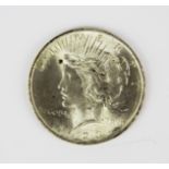 A United States 1923 one dollar coin.