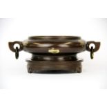 A superb Chinese cast bronze censer and stand with gilt splash decoration, W. 21cm, H. 8.5cm.