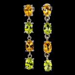 A pair of 925 silver drop earrings set with oval cut peridots and citrines, L. 3.8cm.