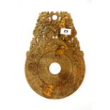 A Chinese archaic form carved jade/hardstone Pi disk, mounted with dragons, 32.5 x 23cm.